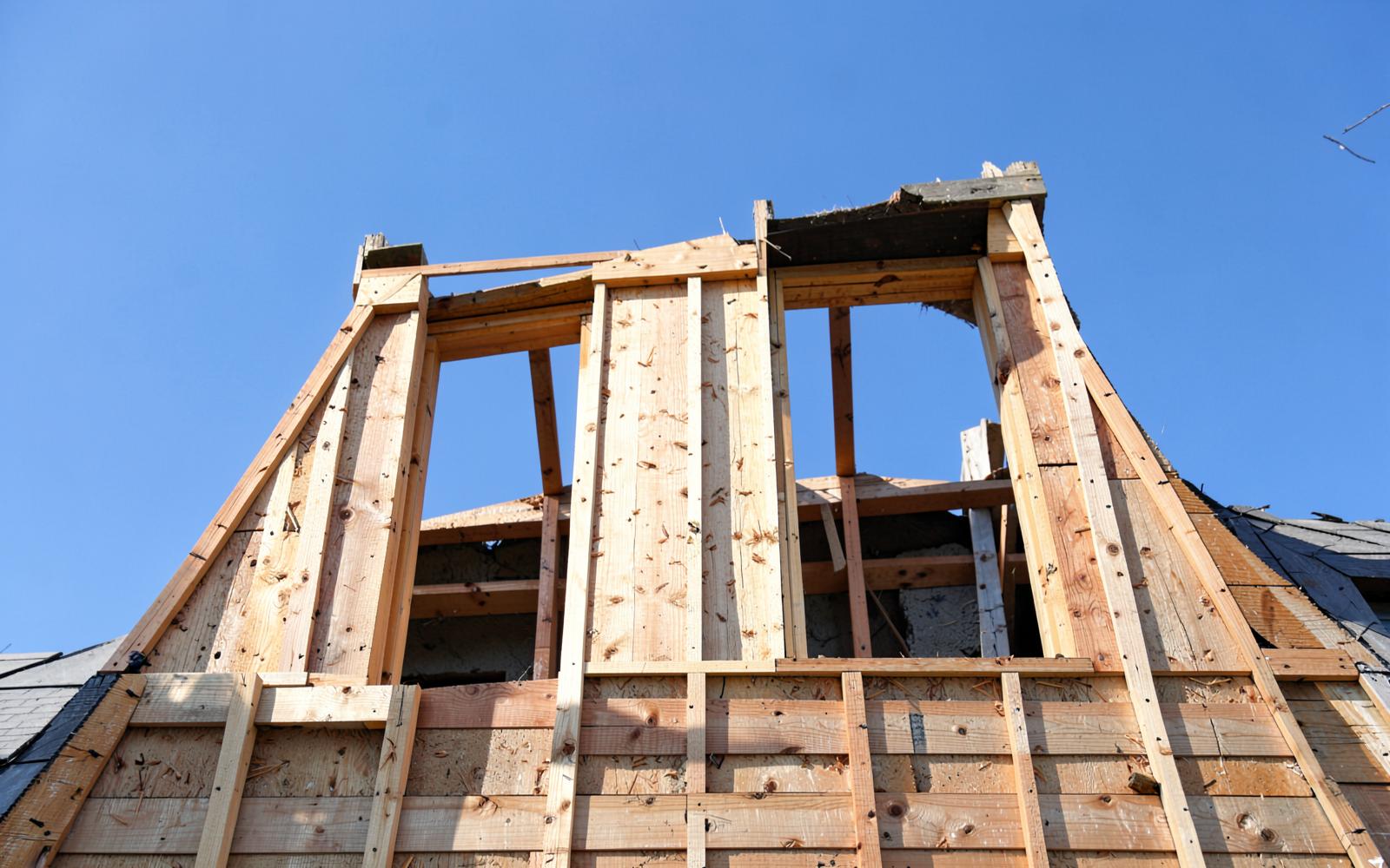 Second story addition framed and closed in on a New Jersey ranch home